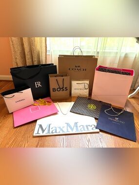 Collection of 11 designer gift bags. Size S, M, L, XL
